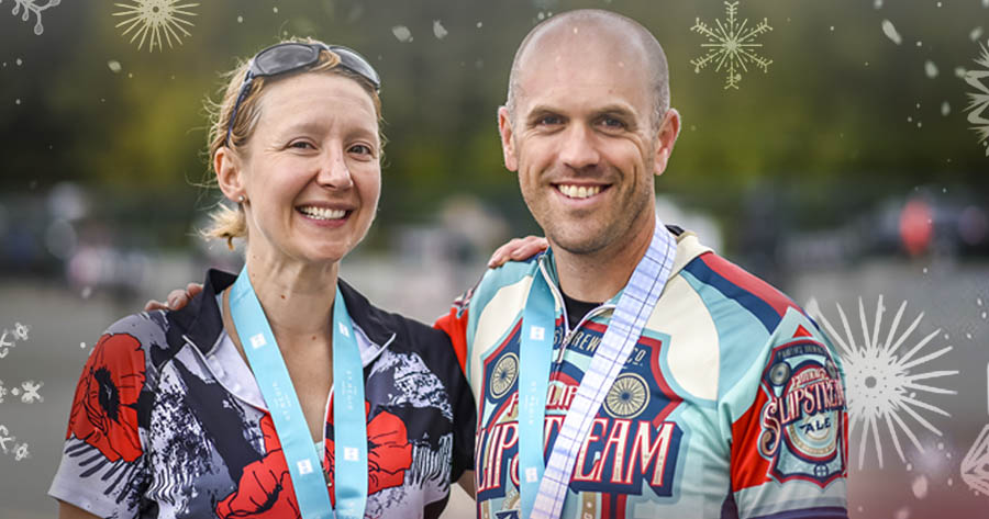 Cyclists sharing finish line smiles