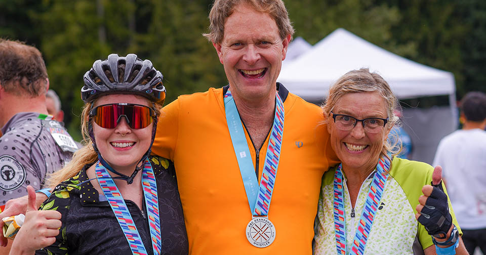 Riders celebrate with their medals